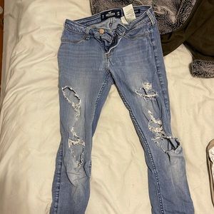ripped hollister jeans width 25 length 28